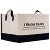 A beige and black tote bag with the text "I Rescue Books Trapped in the Bookstore I'm not a hoarder, I'm a hero" printed on it.