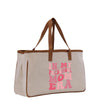 a canvas bag with a pink print on it
