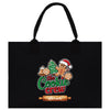 A black tote bag with a colorful graphic design featuring a gingerbread man, a Christmas tree, and the text "The Cookie Crew" along with the name "Sarah".