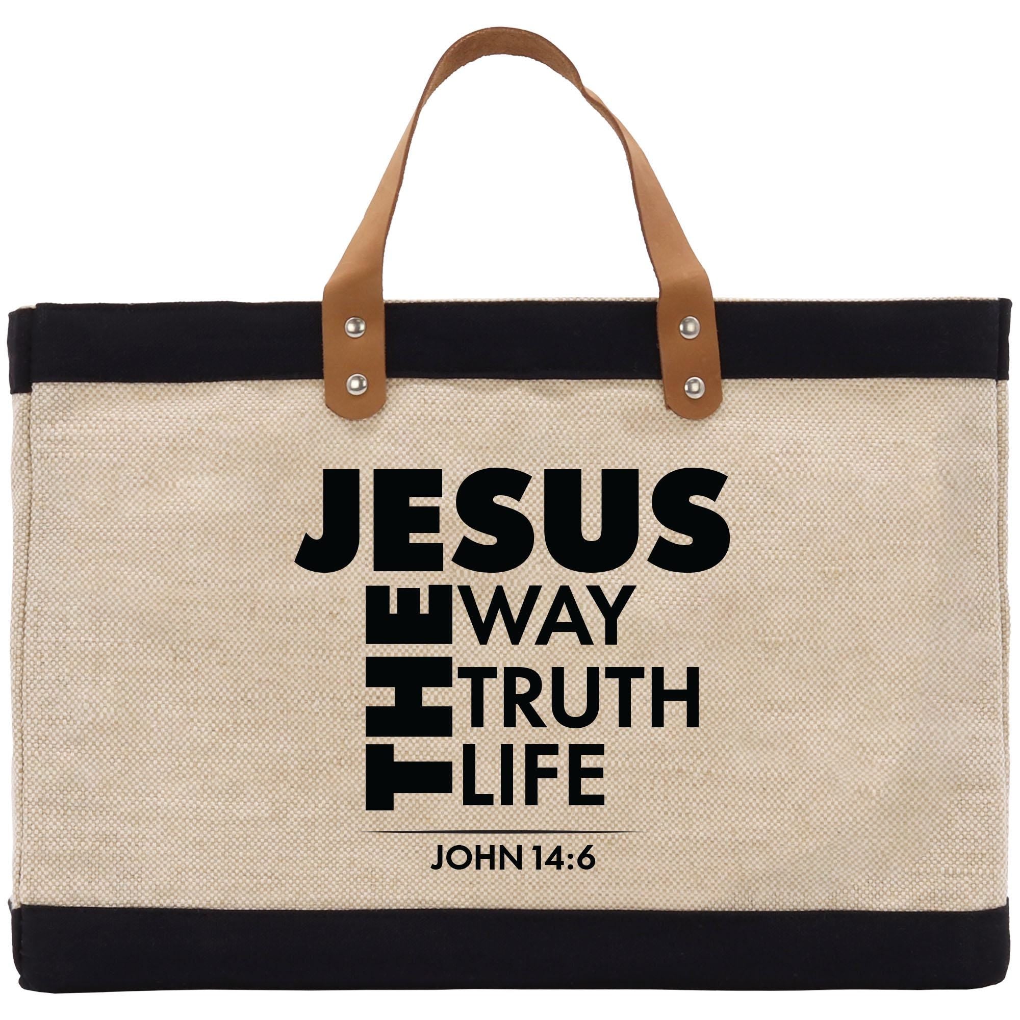 a canvas bag with a bible verse on it