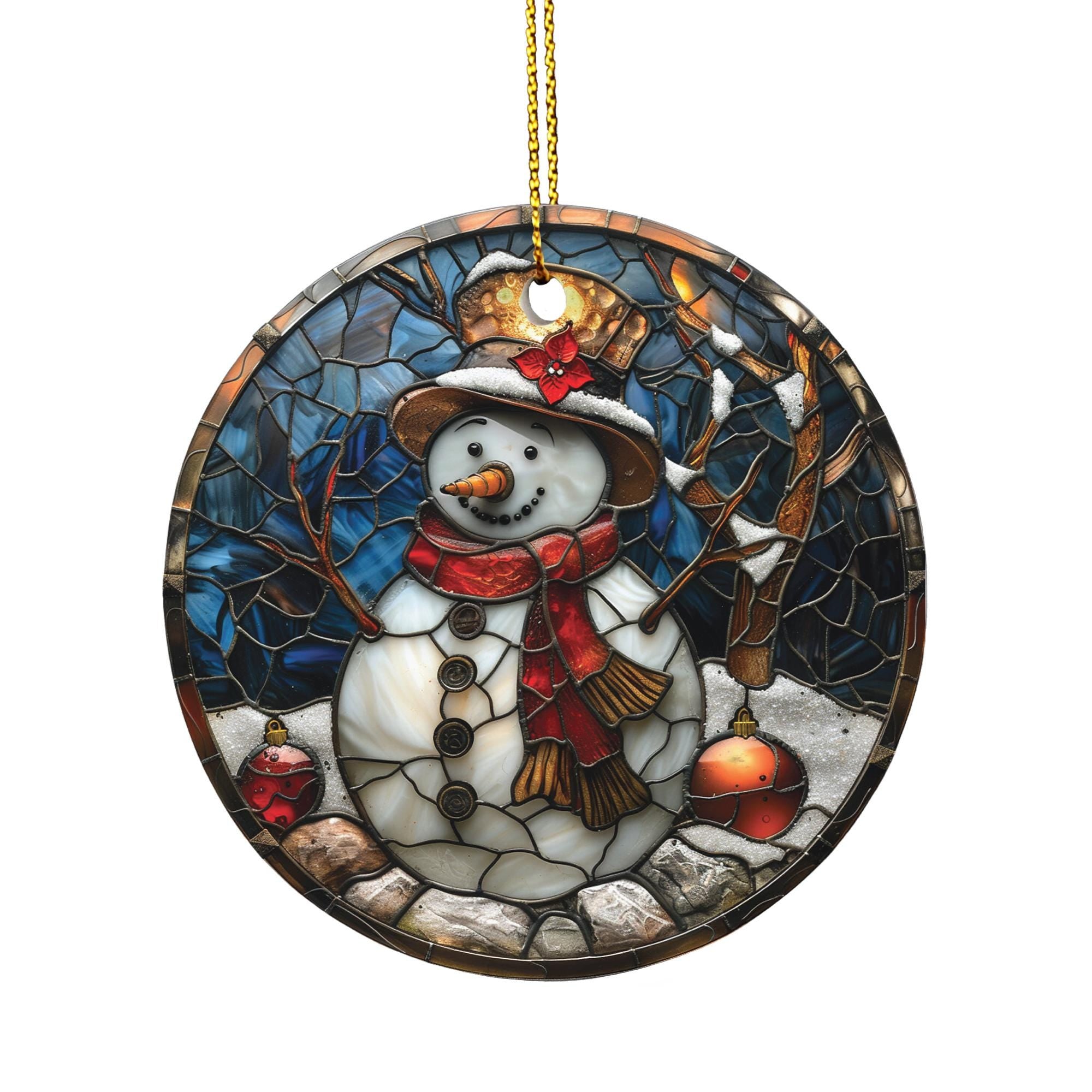 A stained glass ornament depicting a snowman with a red scarf and hat, surrounded by snow and rocks, with two ornaments on its body.