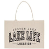 a white bag with the words lake life location printed on it