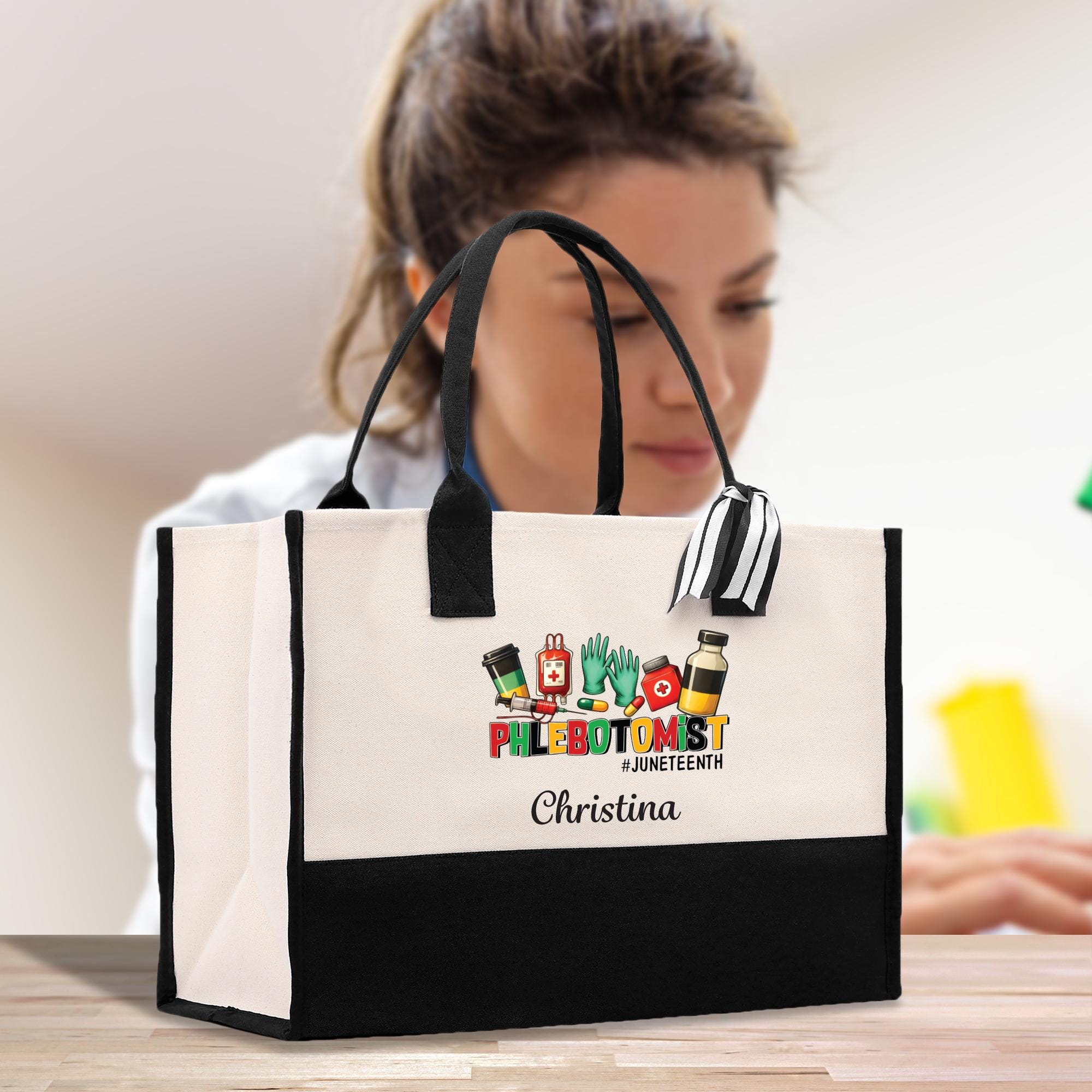 a woman sitting at a table with a black and white bag