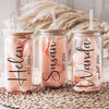 three personalized mason jars with straws in them