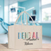 a white shopping bag sitting on top of a wooden table