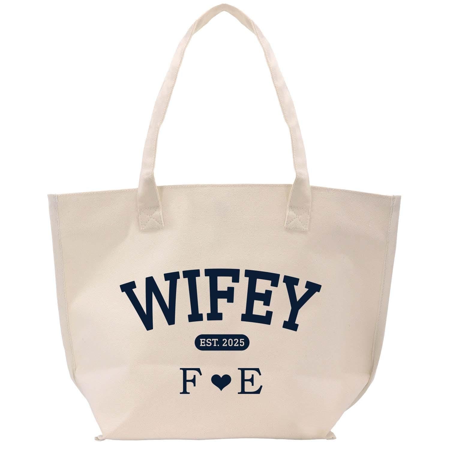 a white tote bag with the words wife on it