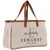 a white bag with brown handles and a brown strap