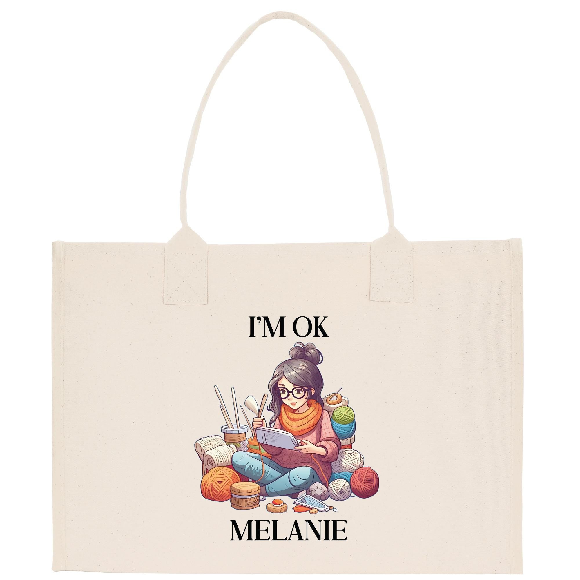 a white bag with a picture of a girl reading a book