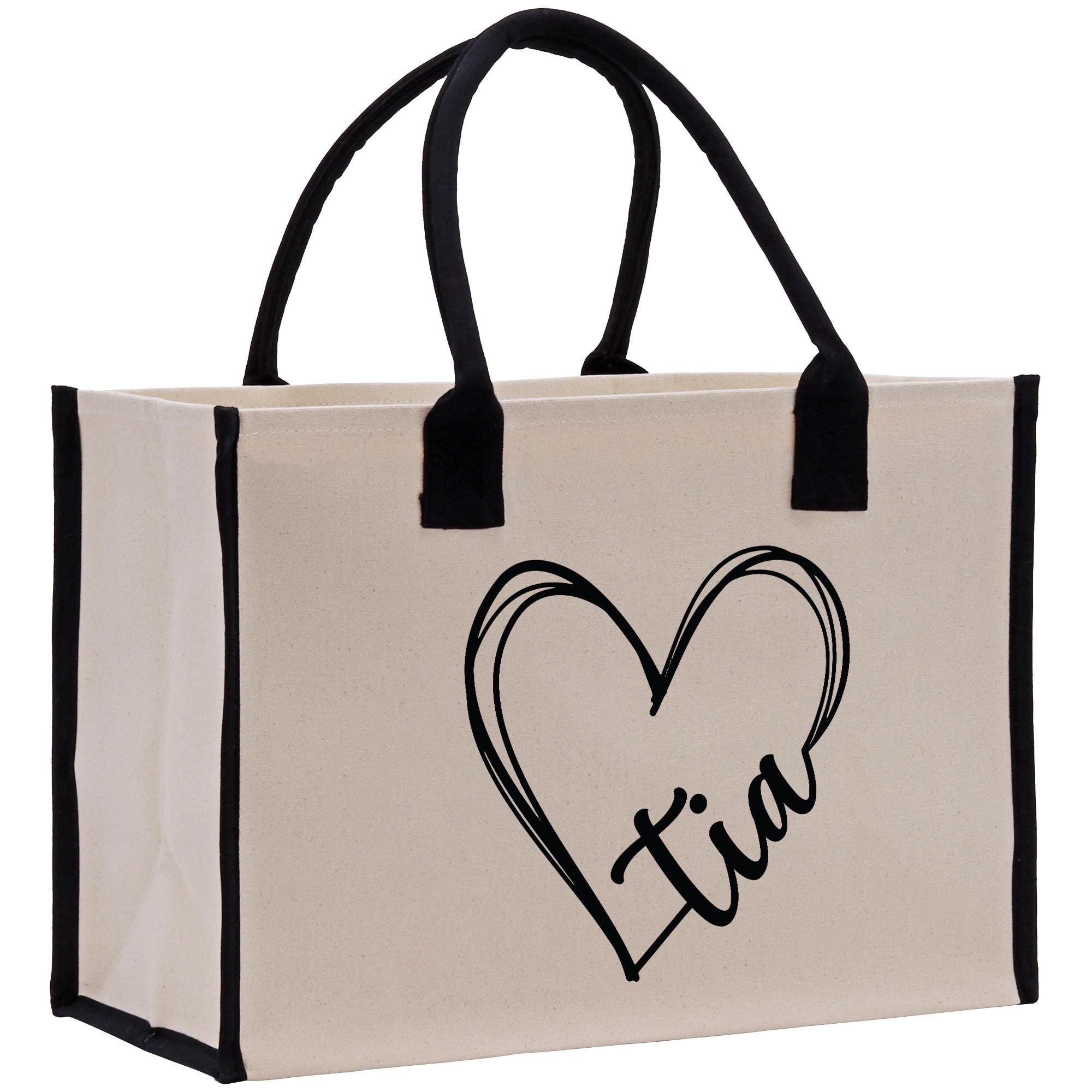a canvas bag with a heart and the word love on it