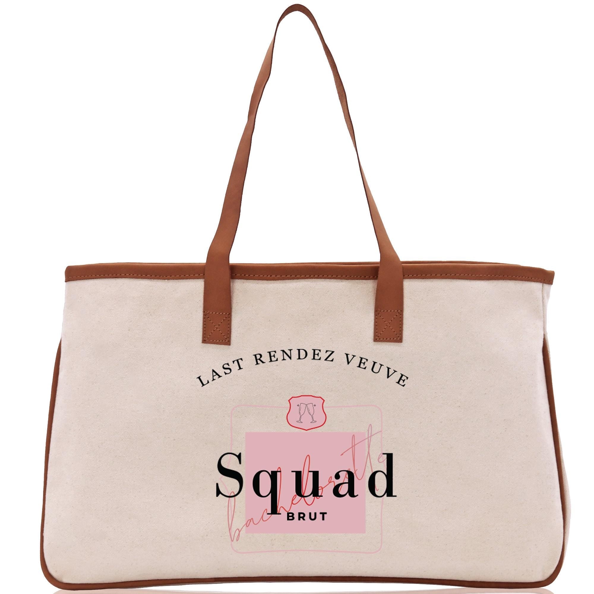a large white bag with a brown handle