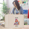 a woman is looking at her phone while holding a shopping bag