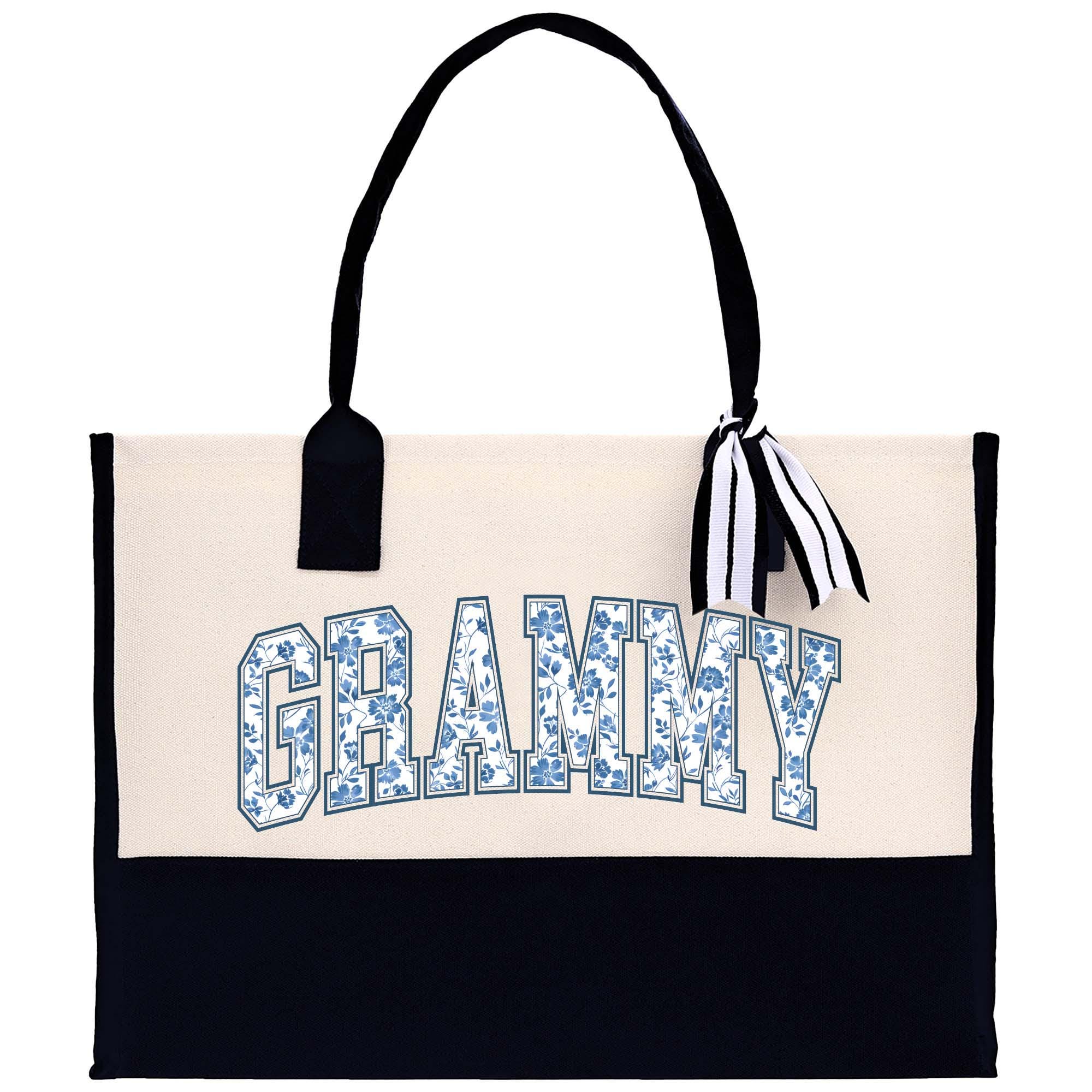 a white and black bag with a name on it