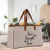 a canvas bag that says live laugh love