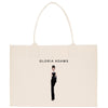 a white shopping bag with a picture of a woman in a tuxedo