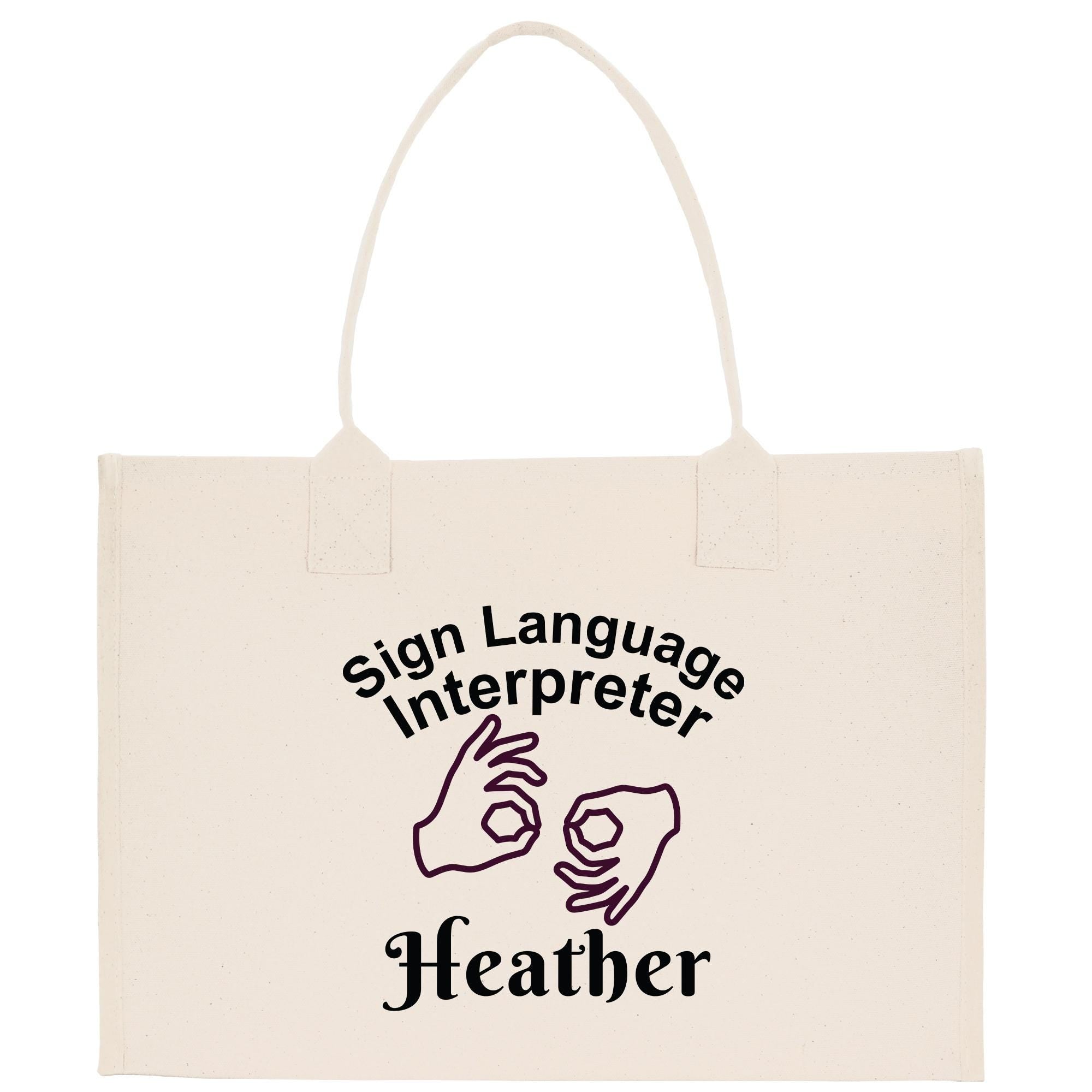 A beige tote bag with a printed design that says &quot;Sign Language Interpreter Heather&quot; and features hand gestures.