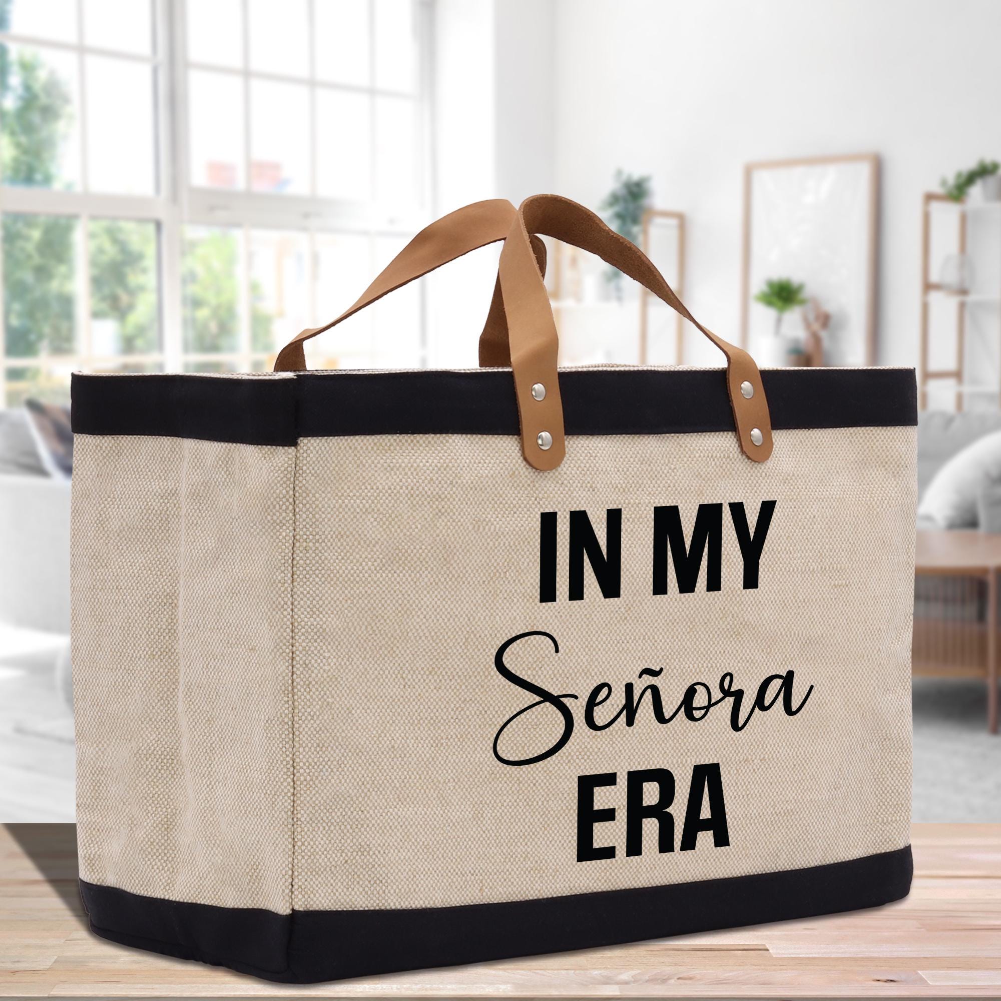 a canvas tote bag with the words in my senior era printed on it