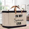 a canvas tote bag with the words in my senior era printed on it