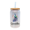 A frosted glass tumbler with a straw, featuring a colorful illustration of a peacock on the front.