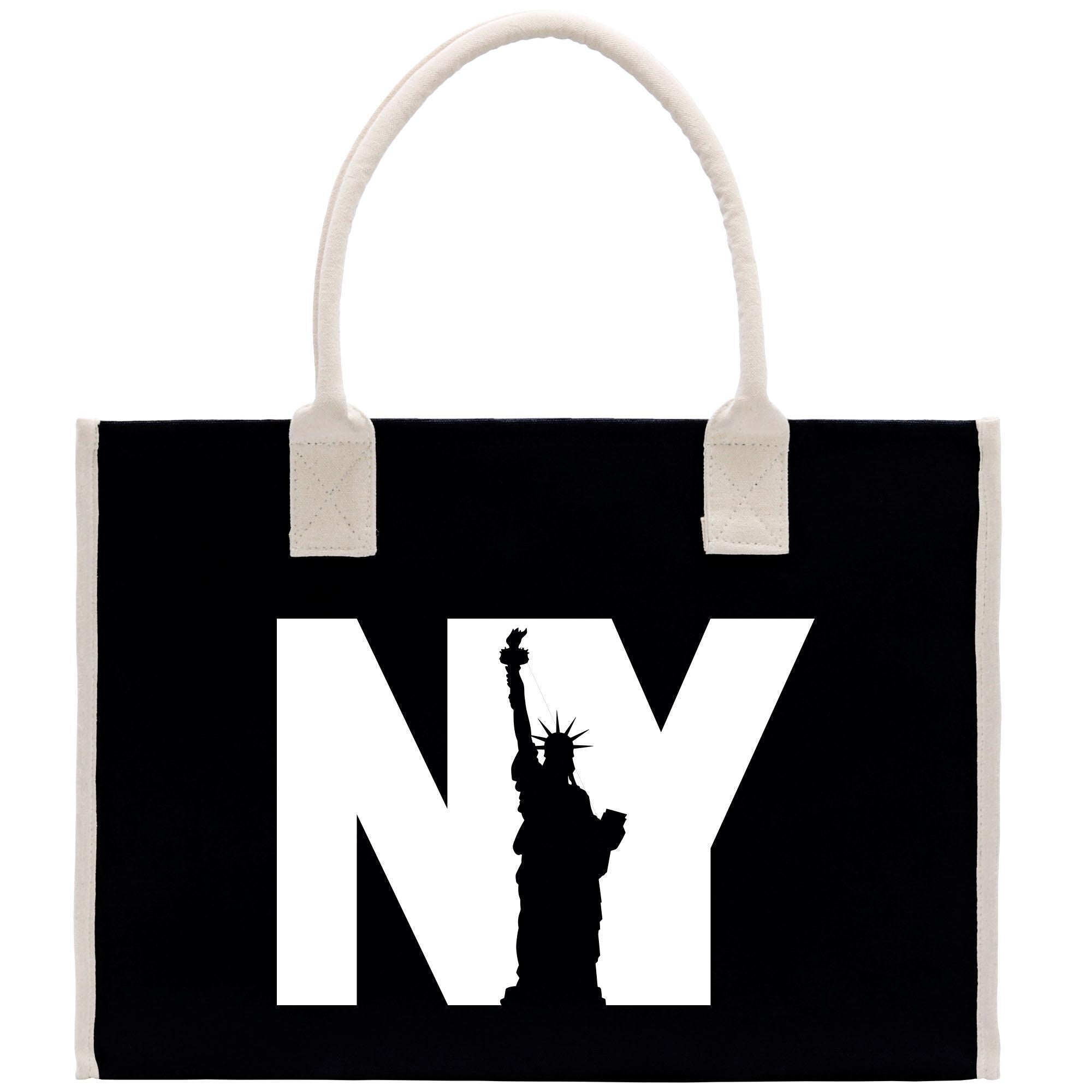 a black and white bag with the statue of liberty on it
