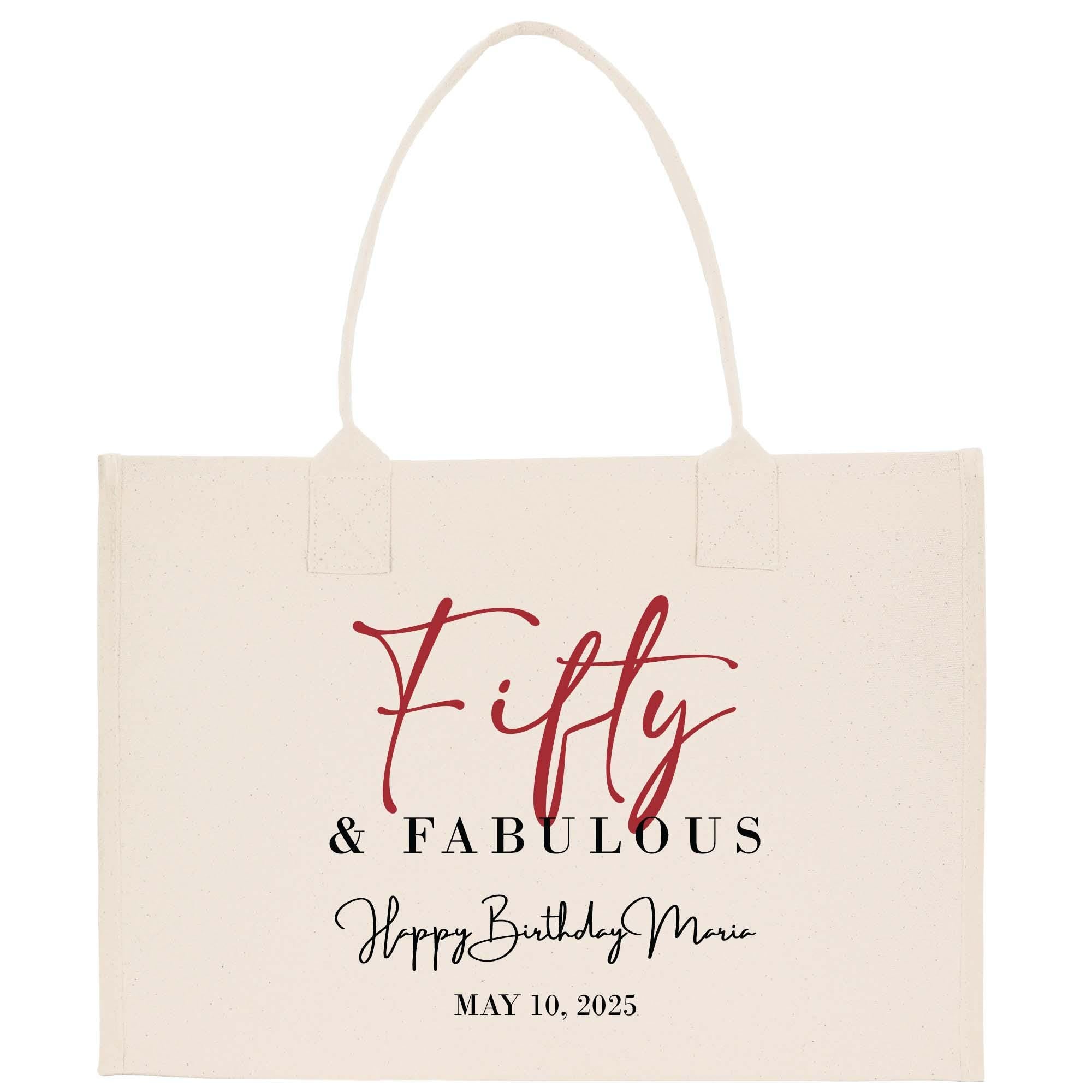 a white shopping bag with the words fifty and fabulous printed on it