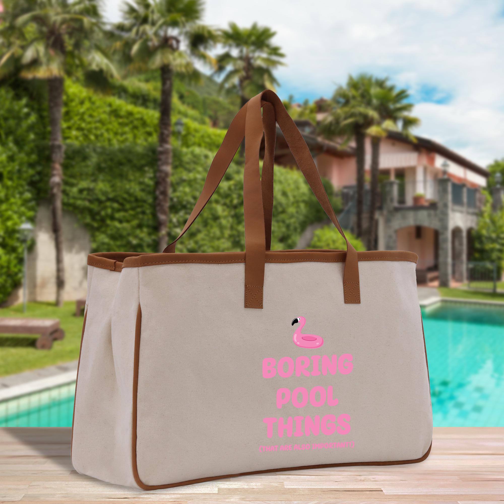 a bag sitting on top of a wooden table next to a pool