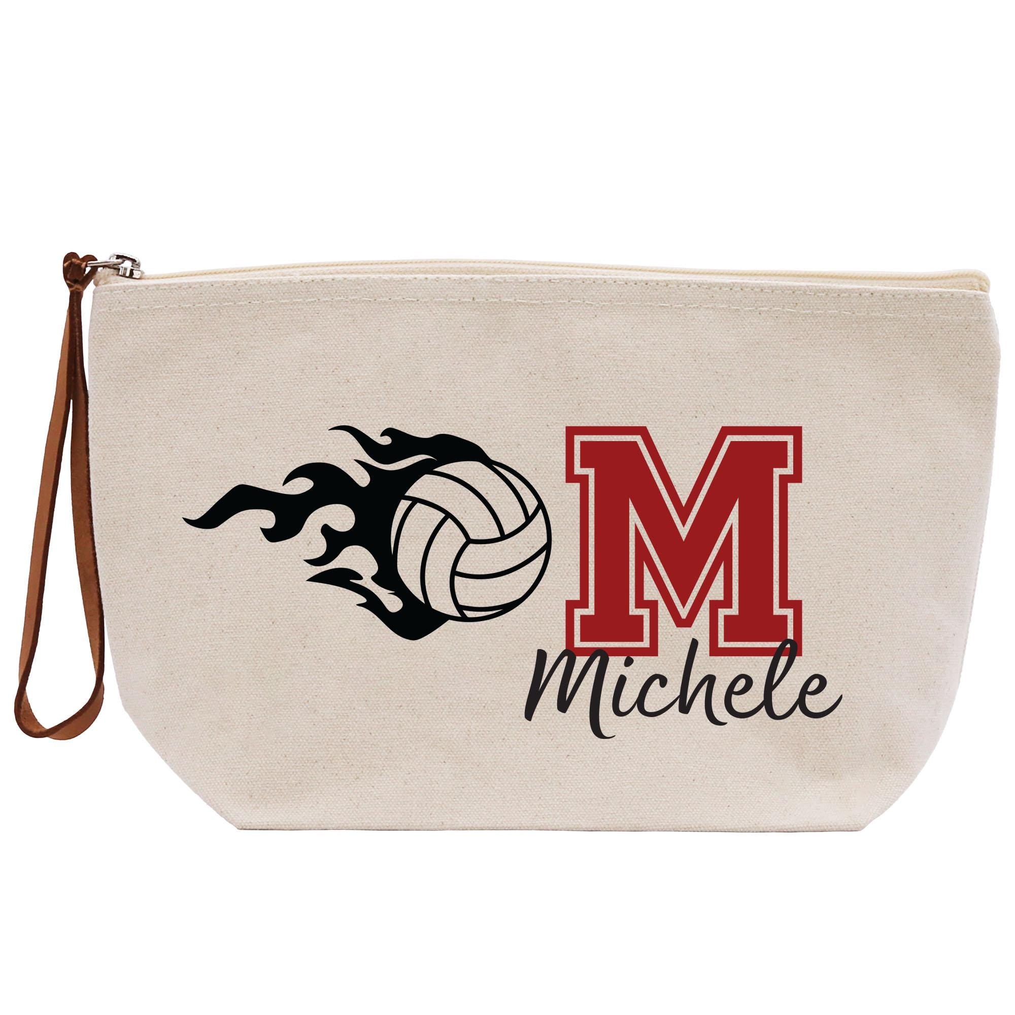 a white bag with a volleyball on it