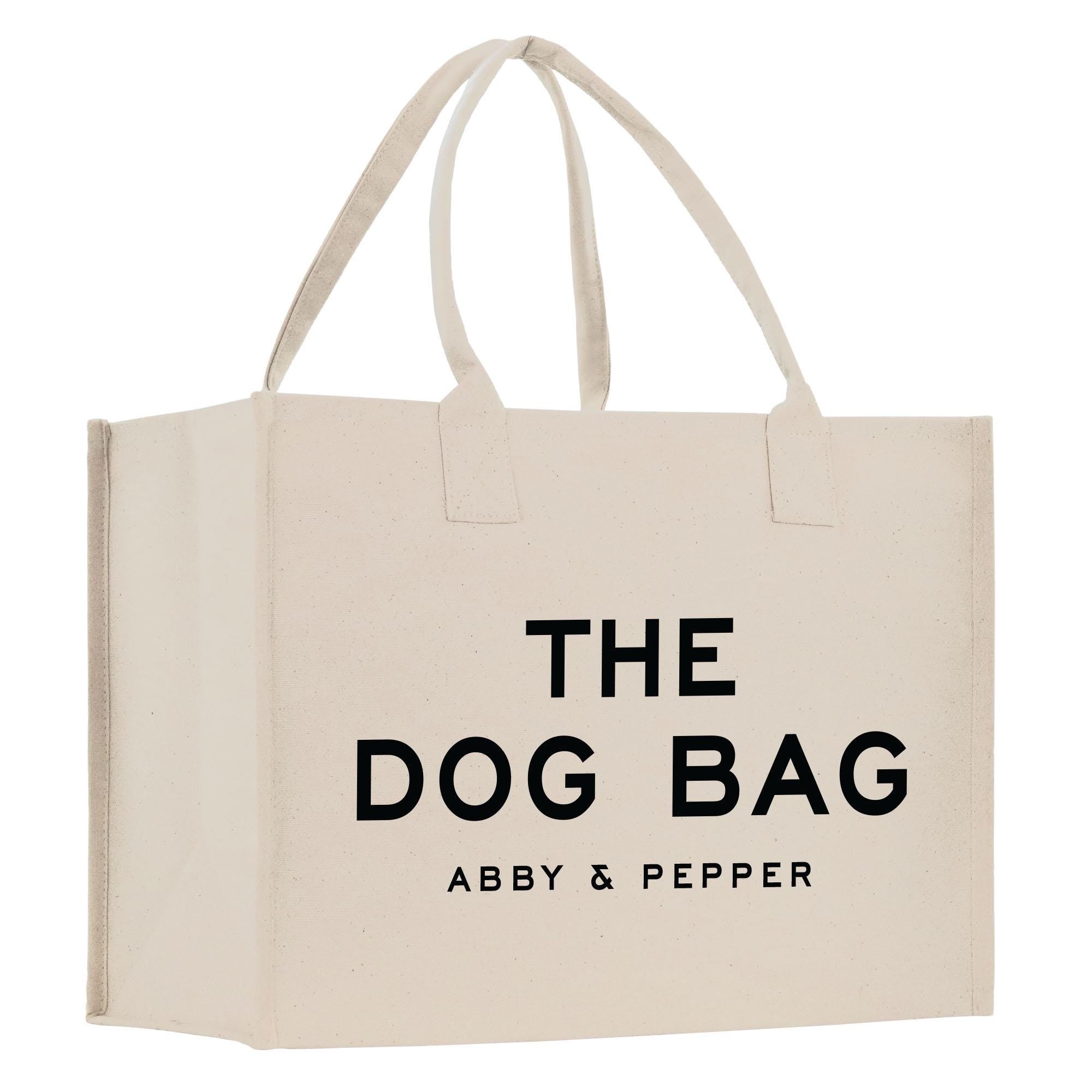 a white bag with the words the dog bag on it