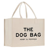 a white bag with the words the dog bag on it