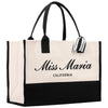 a black and white shopping bag with the word miss marina on it