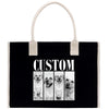 A black tote bag with a white handle and the word "CUSTOM" printed on it. The bag has a collage of four black and white photographs of dogs, each with a different expression.