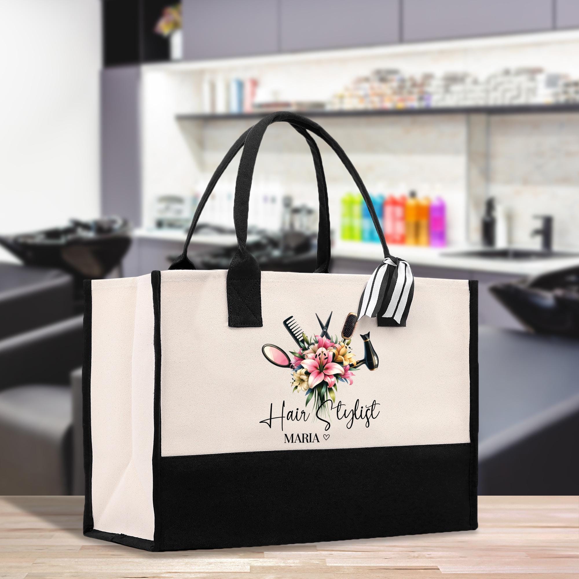 a black and white bag sitting on top of a wooden table