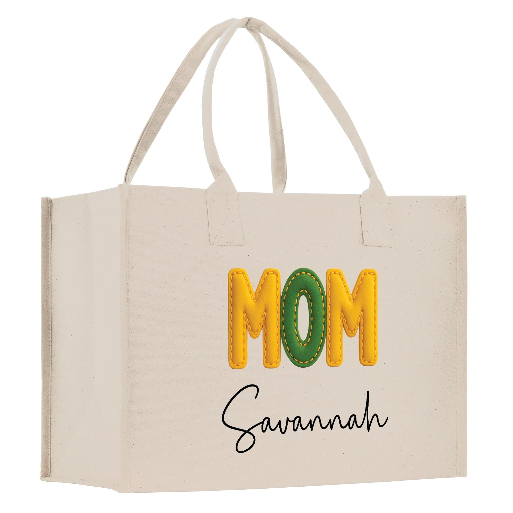 A beige canvas tote bag with the word &quot;MOM&quot; printed in large letters and the name &quot;Savannah&quot; written below it.