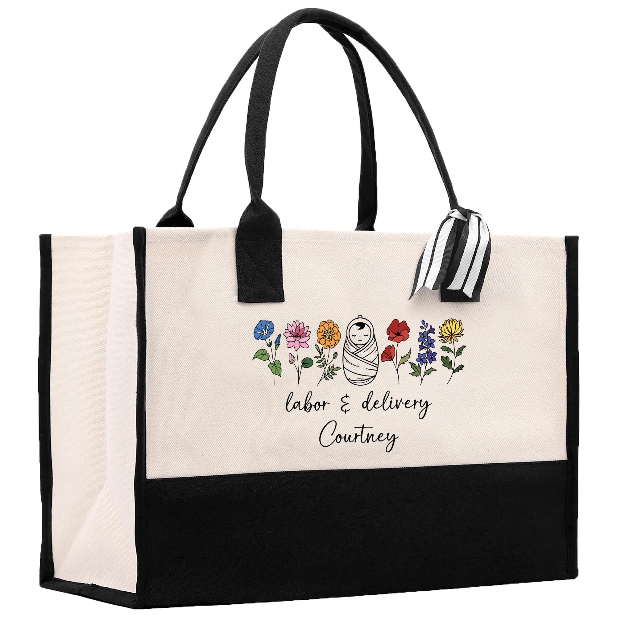 a black and white shopping bag with a cartoon character on it