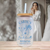 A frosted glass tumbler with a straw, featuring a design of a cocktail glass, palm tree, and star, along with the text "CAROL'S Bachelorette Weekend Charleston, SC July 25, 2015".