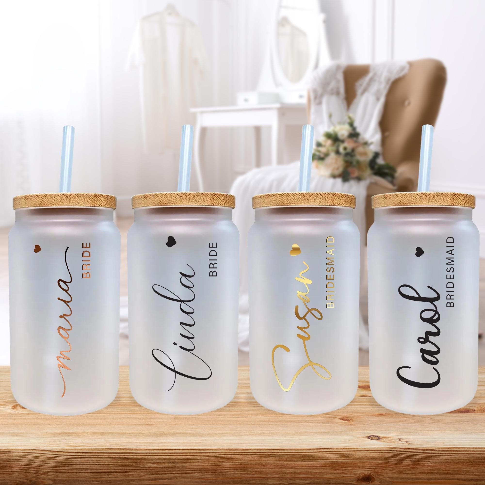 a group of three personalized water bottles sitting on a table