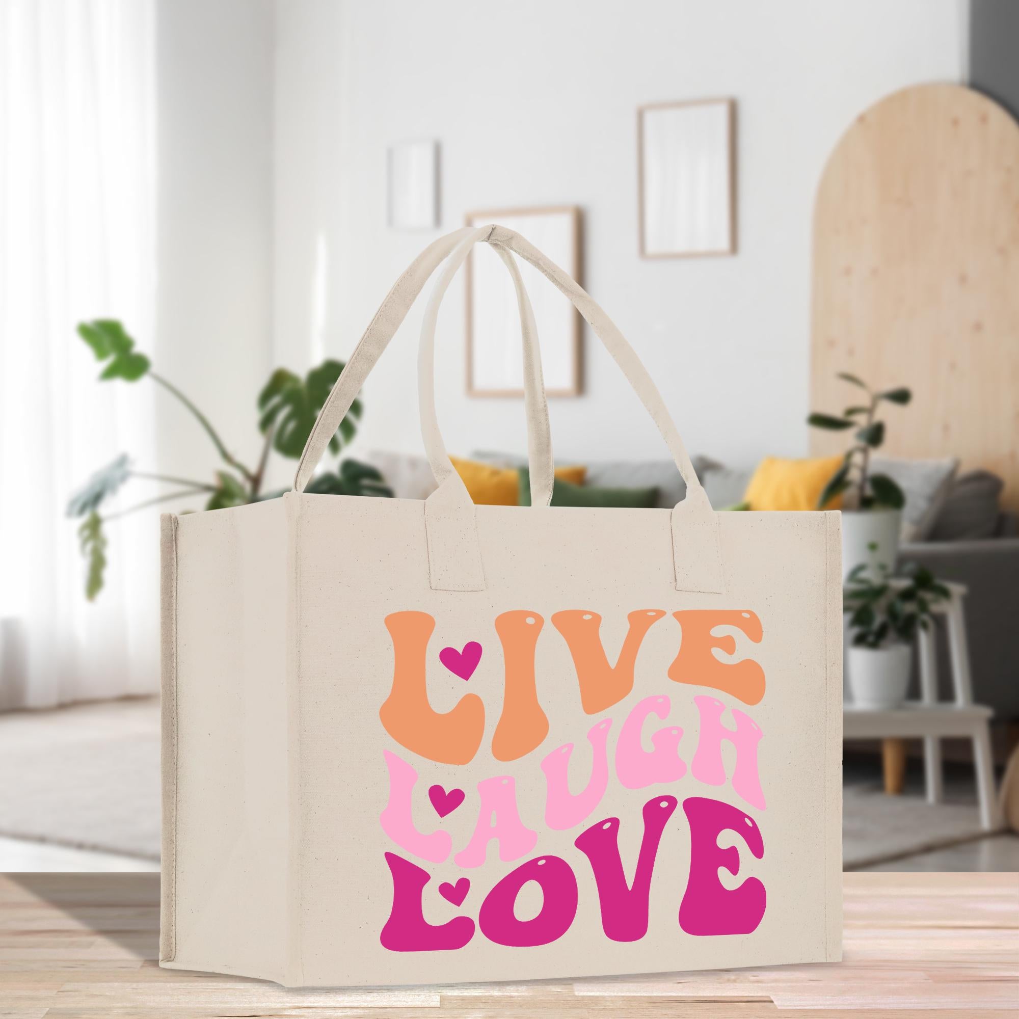 a white bag with a pink and orange design on it