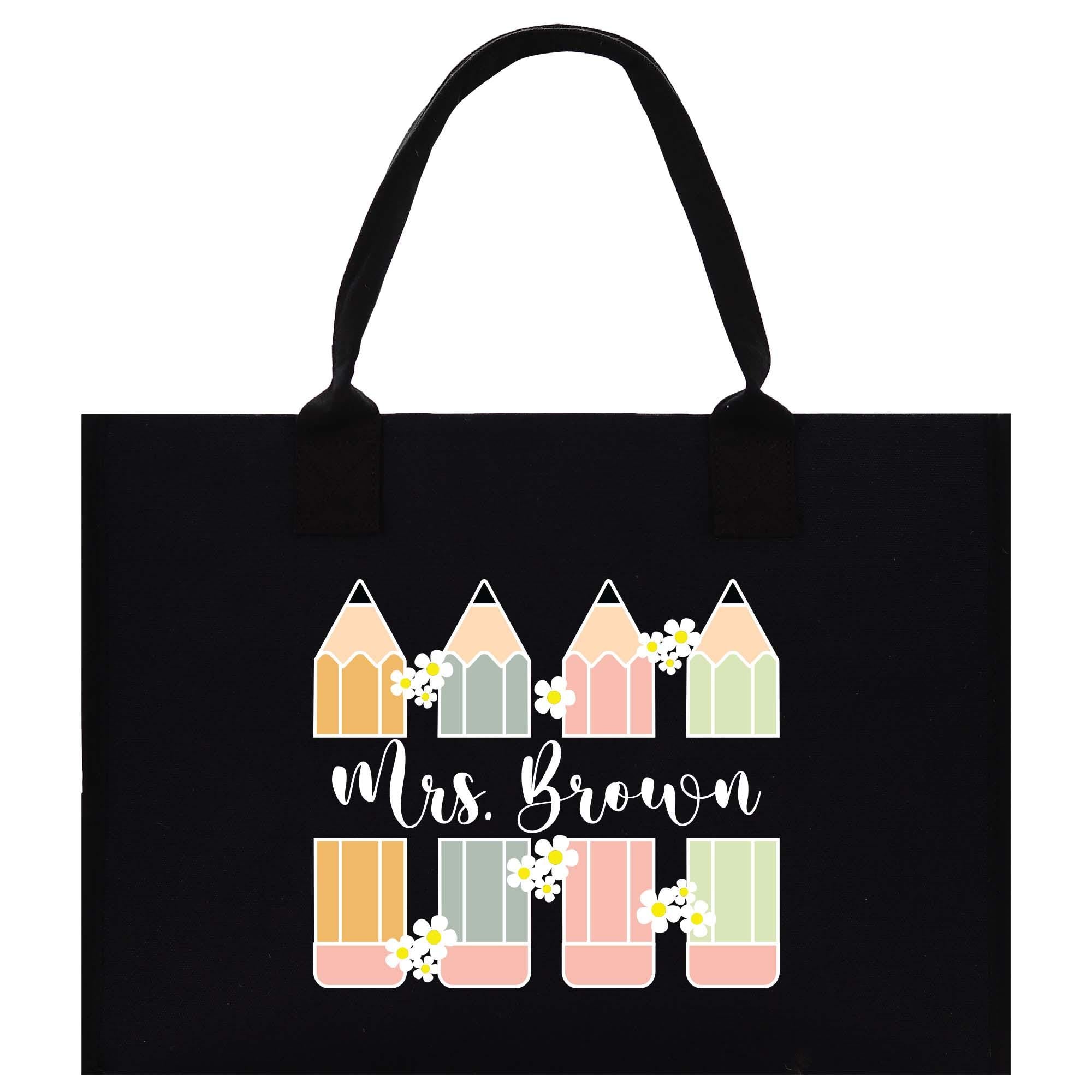 a black shopping bag with a picture of a row of houses