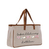 a white bag with pink bows on it