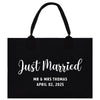 a black tote bag with the words just married printed on it