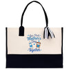 a black and white tote bag with a picture of a mother's day