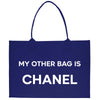 a blue bag that says, my other bag is chanel