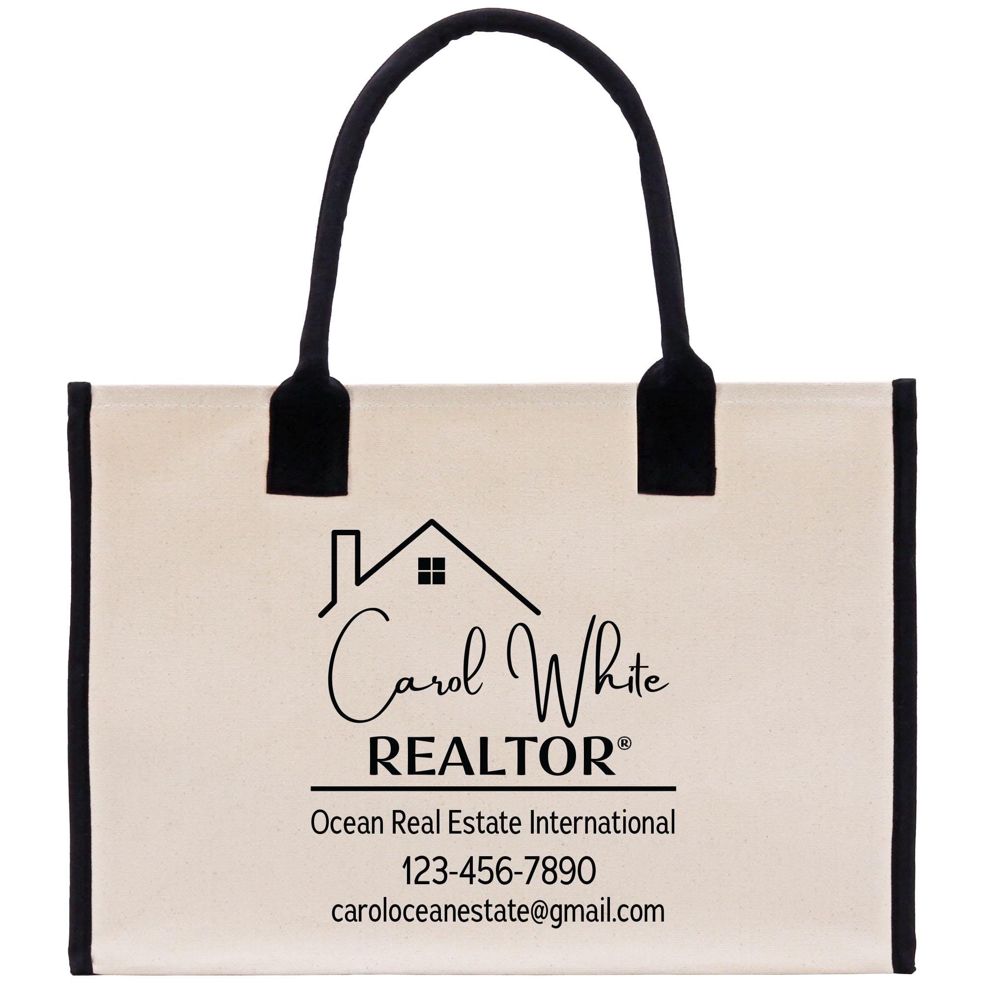 a white bag with black handles and a logo on it