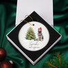 a christmas ornament with a german shepherd dog