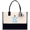 a black and white bag with a striped handle