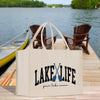 a lake life bag sitting on a dock