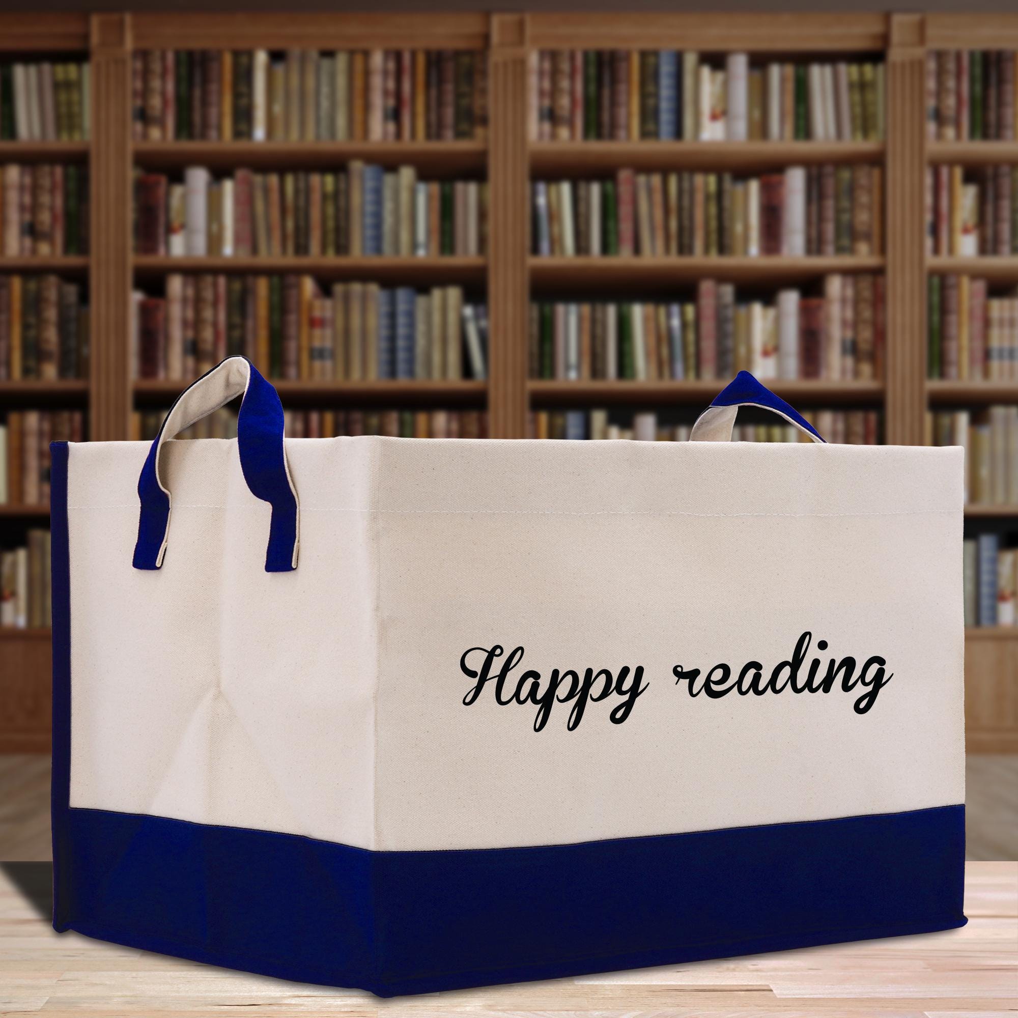 a white and blue shopping bag sitting on top of a wooden table
