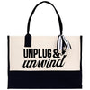 A black and white tote bag with the text 