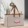 a canvas bag sitting on top of a wooden table