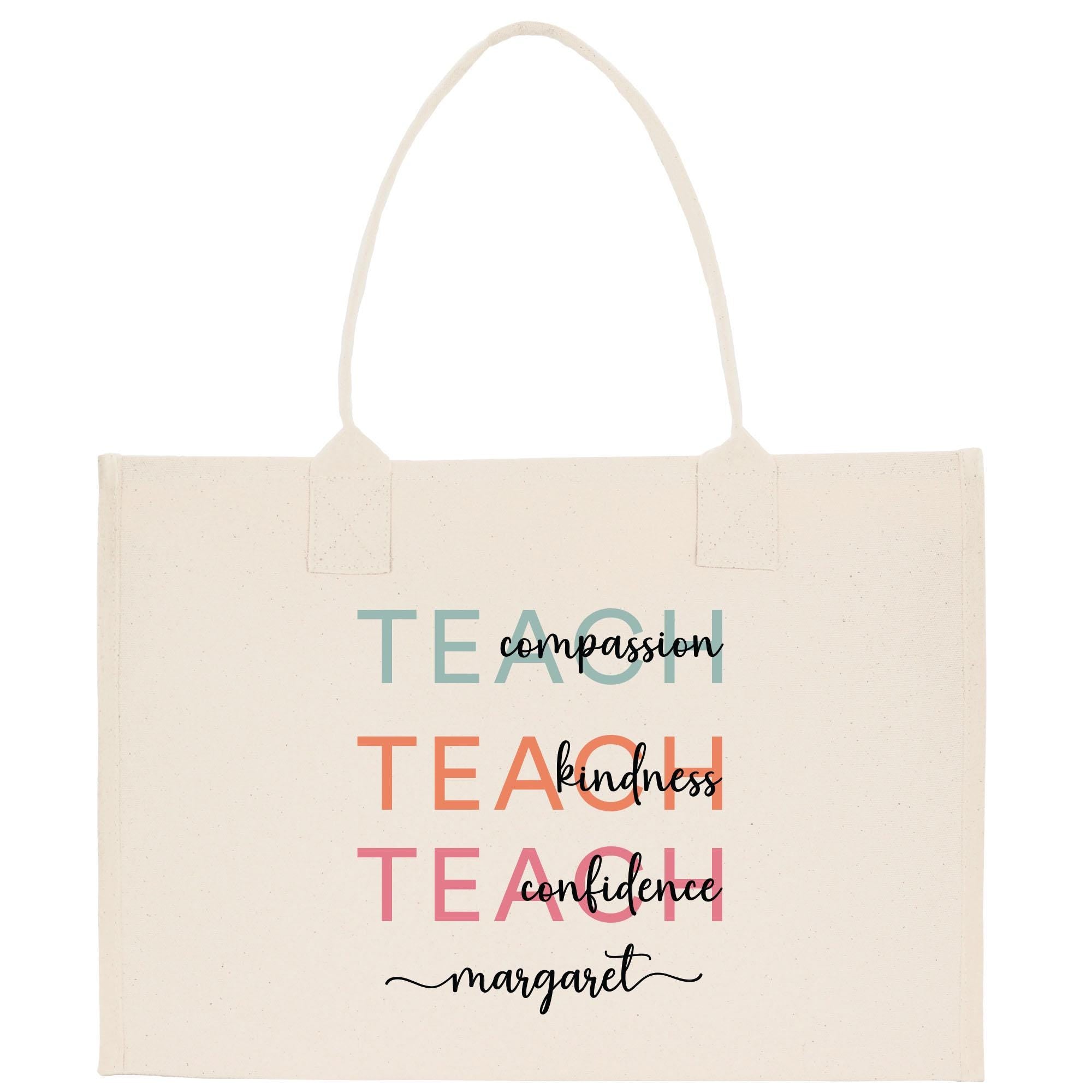 a canvas bag with the words teach on it