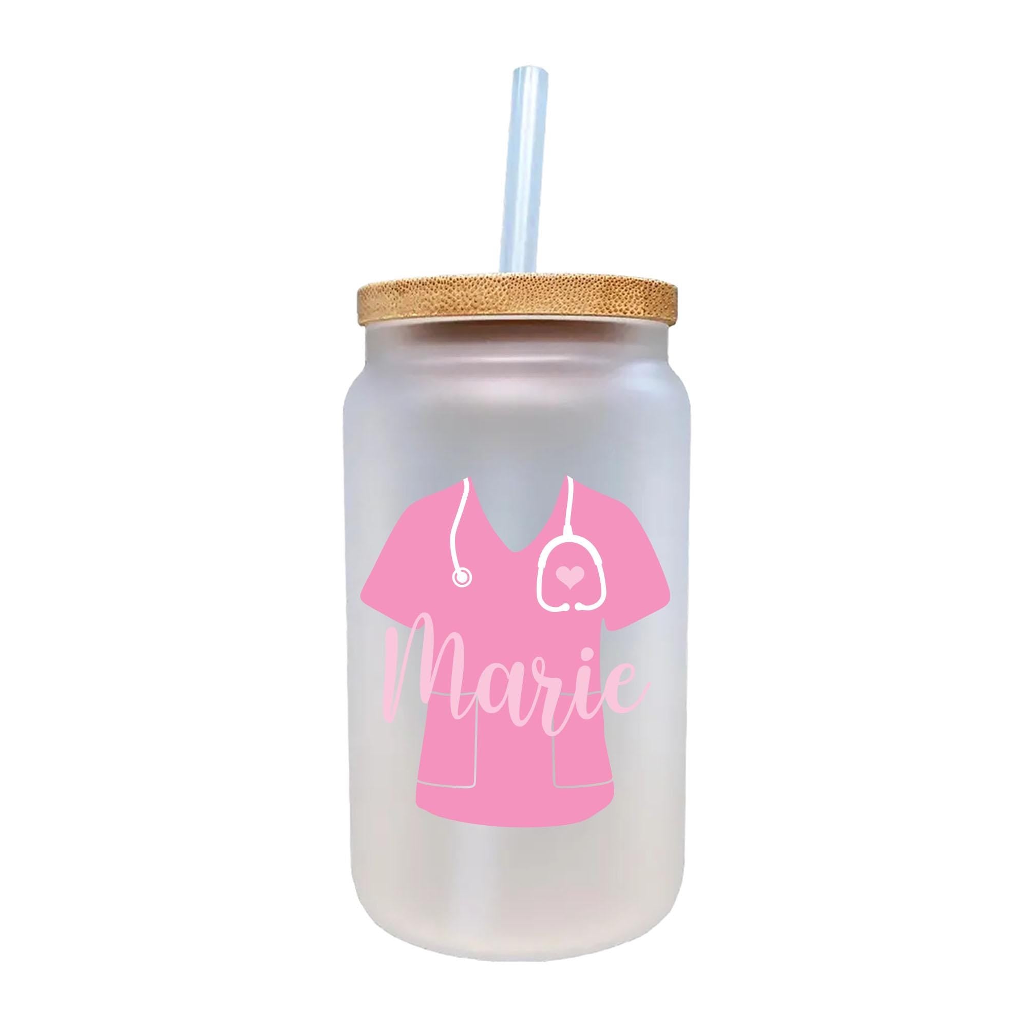 a glass jar with a straw in it